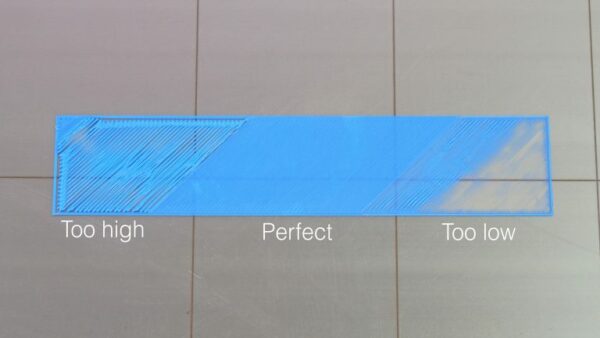 Examples of a first layer that is too high, too low, and perfect